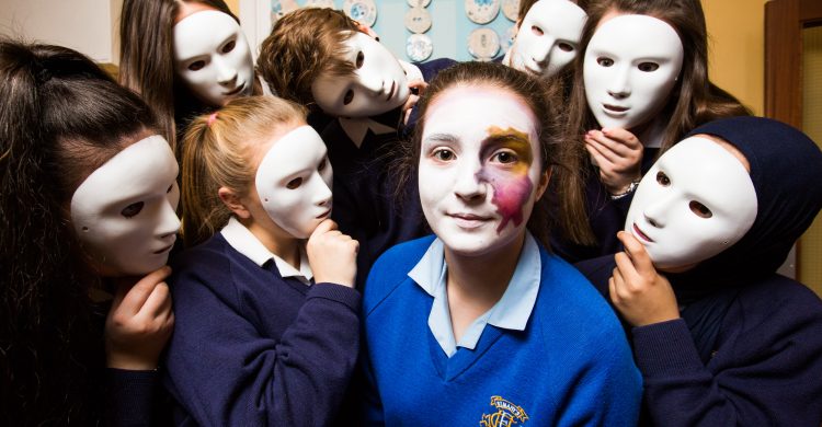 No repro fee
25-10-2016
Picture shows Lauren McCausland fifth year(with face paint); surrounded by 2nd year art students (with masks)  from St Mary’s Secondary School, H F, Glasnevin, Dublin at one of the school’s two permanent NAPD Creative Engagement Project installations ,marking the the Art Teachers’ Association of Ireland launch of the #stateoftheart campaign to raise awareness of the urgent need for change in Leaving Certificate Art highlighted by a day of action on Oct 26th.Pic:Naoise Culhane-no fee
The campaign is designed to raise awareness of the urgent need for reform in the Leaving Cert Art curriculum. 
Key points for change: 
Marking scheme: the current system means A1s are proportionally less achievable than any other Leaving Cert subject. 
Curriculum development & reform: despite requests, the Art Leaving Cert curriculum has not been revised since 1972. 
Third level Art entry requirements: Leaving Cert Art itself is not required for entry to 3rd level (matriculation). However, portfolios are an essential component of entry, but aren’t covered within the curriculum. This puts extra financial and time pressure on students during the crucial Leaving Cert year. 
It is essential that the Department of Education, National Council for Curriculum and Assessment (NCCA) and State Examination Commission (SEC) work together with art teachers, parent and student groups and relevant partners in culture and industry to design and implement a new Leaving Cert curriculum, not simply assessment reform. 
Please support our day of action on 26th of October 2016; to raise awareness and promote change for students of today and to ensure the future creativity of our country. 
Please visit our website www.artteachers.ie for further information. Your support in this campaign is important and greatly appreciated. 
For Further info Please contact www.artteachers.ie or 
Nadine McDonogh Cunningham – President   atai.president@gmail.com 
Pic:Naoise Culhane-no fee