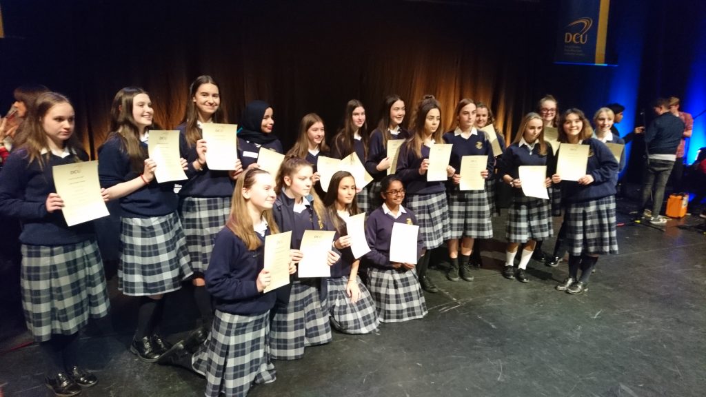 Our award recipients proudly displaying their certificates on the stage of the Helix after last night's ceremony.