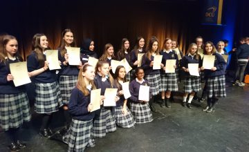 Our award recipients proudly displaying their certificates on the stage of the Helix after last night's ceremony.