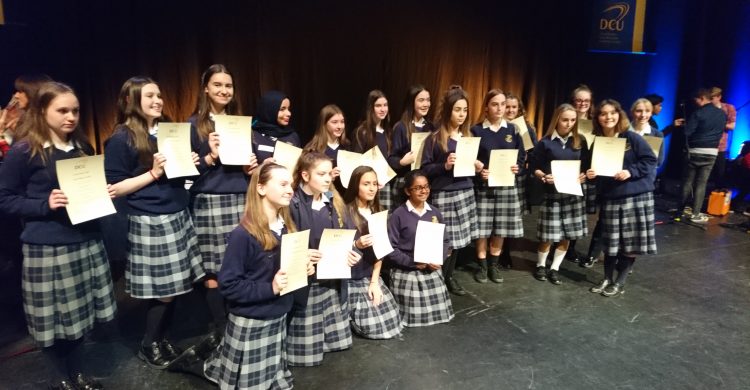 Our award recipients proudly displaying their certificates on the stage of the Helix after last night's ceremony.